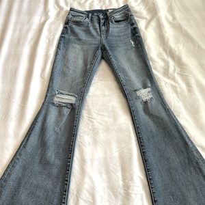Womens light wash flared jeans with rips